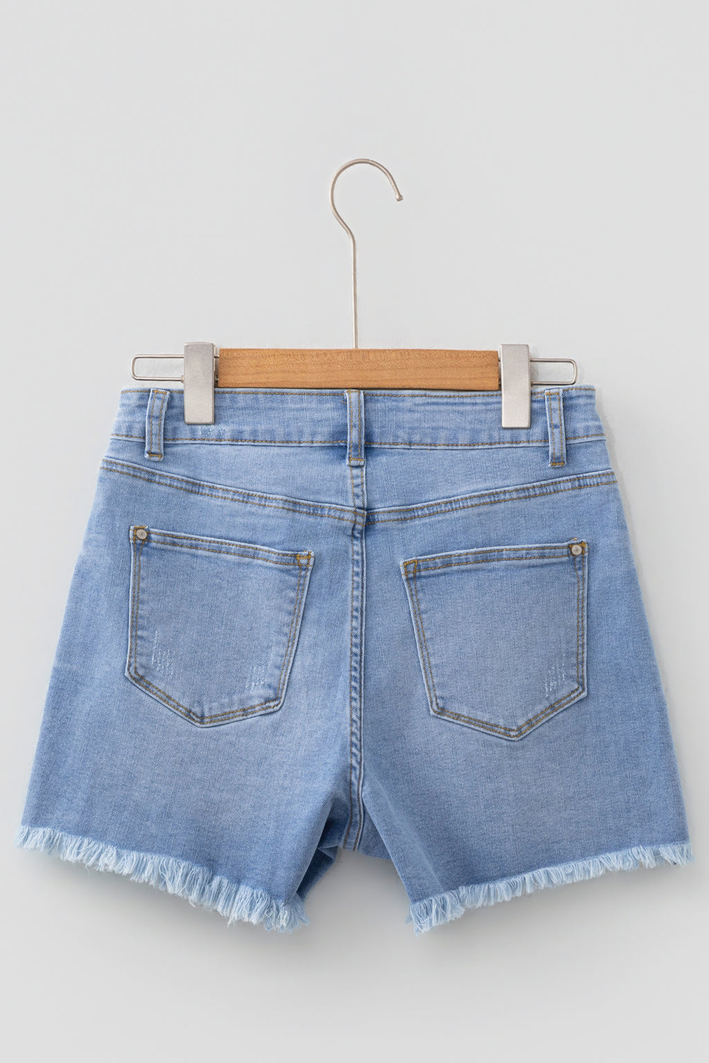 Beau Blue Asymmetric Raw Hem Distressed Whiskery Denim Shorts